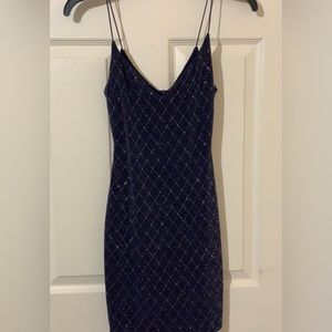 B. Smart homecoming dress. Navy blue with glitter. Size 1 in juniors. Worn once.